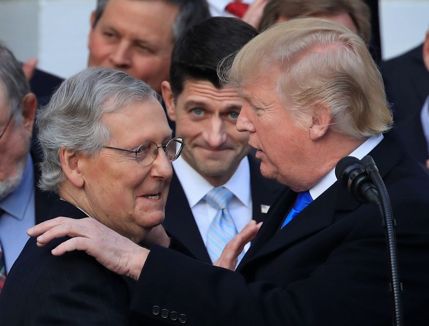 President Trump and House Speaker Paul D. Ryan (center) are pushing for welfare reforms. But Senate Majority Leader Mitch McConnell is skeptical about doing so. (Associated Press)