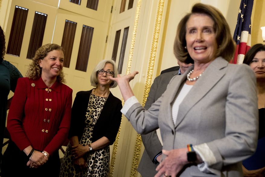 House Minority Leader Nancy Pelosi of Calif., right, recognizes Rep. Debbie Wasserman Schultz, D-Fla., left, during a news conference on American labor on Capitol Hill in Washington, Wednesday, Nov. 1, 2017. Trump said on Twitter that the driver in Tuesday&#39;s attack &quot;came into our country through what is called the &#39;Diversity Visa Lottery Program,&#39; a Chuck Schumer beauty&quot;  a reference to the Senate&#39;s Democratic leader. (AP Photo/Andrew Harnik)