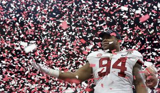 Alabama defensive lineman Da&#39;Ron Payne (94) celebrates after being selected most valuable defensive player, after the Sugar Bowl semi-final playoff game against Clemson for the NCAA college football national championship, in New Orleans, Monday, Jan. 1, 2018. Alabama won 24-6 to advance to the national championship game. (AP Photo/Rusty Costanza) **FILE**