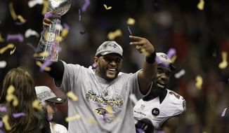 FILE - In this Feb. 3, 2013, file photo, Baltimore Ravens linebacker Ray Lewis holds up the Vince Lombardi Trophy as he celebrates with free safety Ed Reed (20) after the Ravens defeating the San Francisco 49ers 34-31 in the NFL football Super Bowl 47 in New Orleans. Star linebackers Lewis and Brian Urlacher are among four first-time eligible former players selected in the 15 modern-era finalists for the Pro Football Hall of Fame&#39;s Class of 2018. Receiver Randy Moss and guard Steve Hutchinson also made the cut to the finals as first-year eligibles. (AP Photo/Elaine Thompson, File) **FILE**