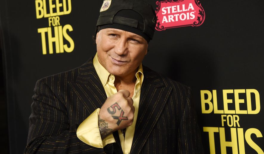 FILE - In this Nov. 2, 2016, file photo, former boxer Vinny Paz, subject of the film "Bleed for This," poses at the premiere of the film in Beverly Hills, Calif. Retired boxing champion Vinny Paz, whose comeback story after a car crash was dramatized in the 2016 film "Bleed for This," has been accused of attacking a Rhode Island man and sending him to the hospital. Providence police say they were called to a home early Tuesday morning, Jan . 2, 2018. They say when officers arrived, witnesses told them Paz had accused a friend of stealing $16,000 and then assaulted him. (Photo by Chris Pizzello/Invision/AP, File)