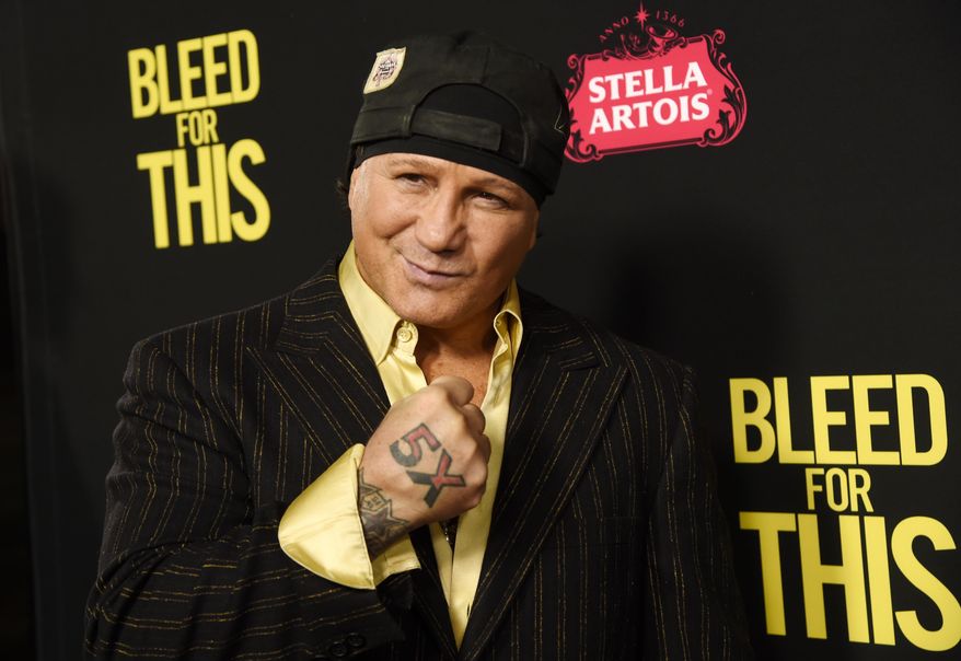 FILE - In this Nov. 2, 2016, file photo, former boxer Vinny Paz, subject of the film "Bleed for This," poses at the premiere of the film in Beverly Hills, Calif. Retired boxing champion Vinny Paz, whose comeback story after a car crash was dramatized in the 2016 film "Bleed for This," has been accused of attacking a Rhode Island man and sending him to the hospital. Providence police say they were called to a home early Tuesday morning, Jan . 2, 2018. They say when officers arrived, witnesses told them Paz had accused a friend of stealing $16,000 and then assaulted him. (Photo by Chris Pizzello/Invision/AP, File)