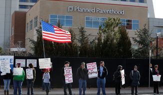 Planned Parenthood is expanding into alternative care as fewer women undergo abortions and patients seek health care services elsewhere. (Associated Press/File)