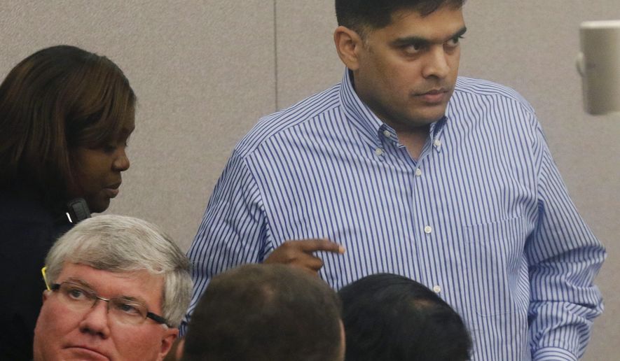 FILE - In this Nov. 29, 2017 file photo Wesley Mathews, father of Sherin Mathews, appears in court at the Henry Wade Juvenile Justice Building in Dallas. An autopsy report shows 3-year-old Sherin Mathews, whose body was found in a culvert near her suburban Dallas home died from "homicidal violence." Wesley Mathews, told investigators that Sherin choked to death on her milk. He is charged with felony injury to a child. (David Woo/The Dallas Morning News via AP, Pool File)