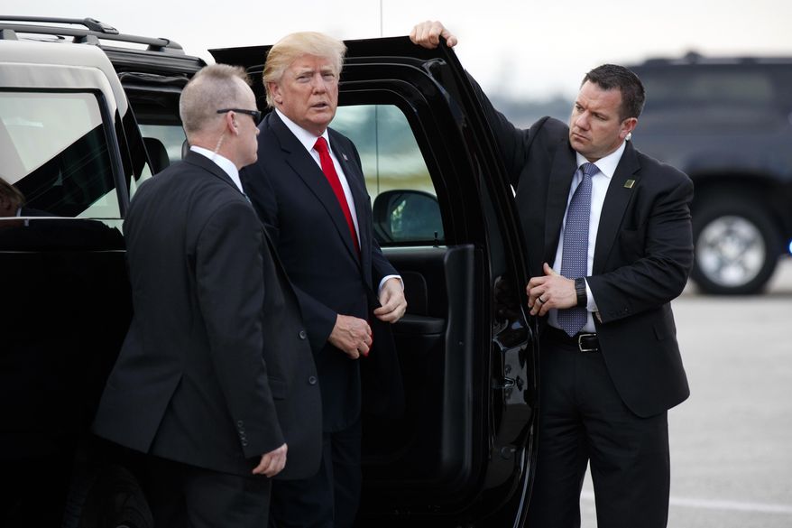 President Donald Trump arrives to board Air Force One at Palm Beach International Airport, Monday, Jan. 1, 2018, in West Palm Beach, Fla. (AP Photo/Evan Vucci)