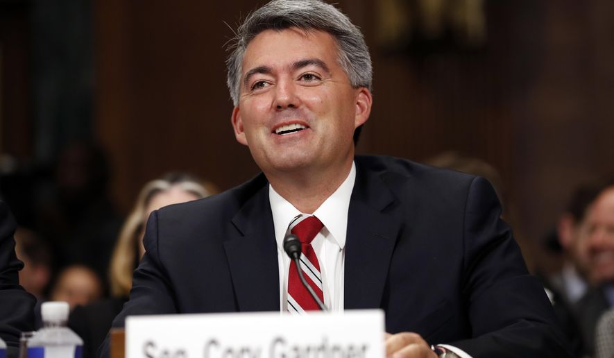 File - In this Sept. 20, 2017, file photo, Sen. Cory Gardner, R-Colo., speaks during a Senate Judiciary Committee hearing on Capitol Hill, in Washington. Sen. Gardner said Thursday, Jan. 4, 2018, that he's placing a hold on Department of Justice nominees and will try to push legislation to protect marijuana sales in states where the drug is legal after Attorney General Jeff Sessions withdrew a federal policy that allowed recreational markets to emerge. (AP Photo/Alex Brandon, File)