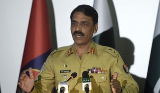 Pakistan&#39;s army spokesman Maj. Gen. Asif Ghafoor addresses a news conference in Rawalpindi, Pakistan. (AP Photo/Anjum Naveed)