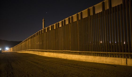 This March 30, 2017, photo shows a portion of the new steel border fence that stretches along the US-Mexico border in Sunland Park, N.M. The Trump administration has proposed spending $18 billion over 10 years to significantly extend the border wall with Mexico. The plan provides one of the most detailed blueprints of how the president hopes to carry out a signature campaign pledge. (AP Photo/Rodrigo Abd) **FILE**
