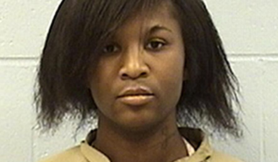 This undated photo provided by the Illinois Department of Corrections shows Deon "Strawberry" Hampton, a transgender Chicago woman serving a 10-year sentence for burglary. Hampton is seeking a transfer from a male to a female prison where she says she'll be less vulnerable to abuse. A federal judge will hear testimony Friday, Jan. 5, 2018, on Hampton's transfer request. (Illinois Department of Corrections via AP)