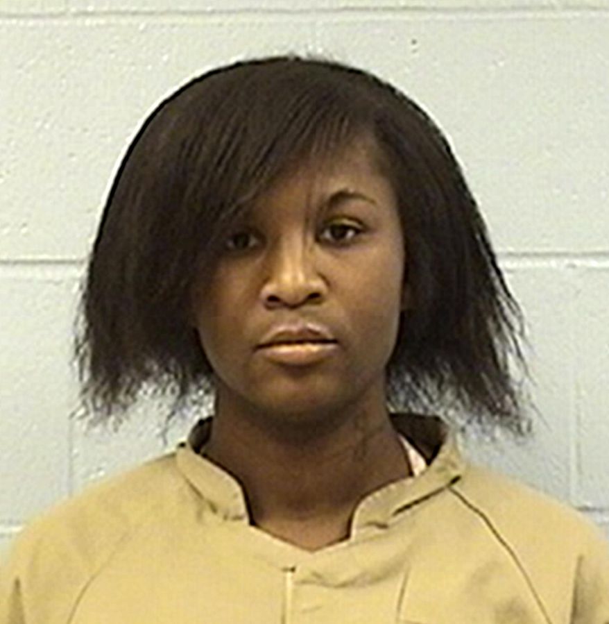 This undated photo provided by the Illinois Department of Corrections shows Deon "Strawberry" Hampton, a transgender Chicago woman serving a 10-year sentence for burglary. Hampton is seeking a transfer from a male to a female prison where she says she'll be less vulnerable to abuse. A federal judge will hear testimony Friday, Jan. 5, 2018, on Hampton's transfer request. (Illinois Department of Corrections via AP)