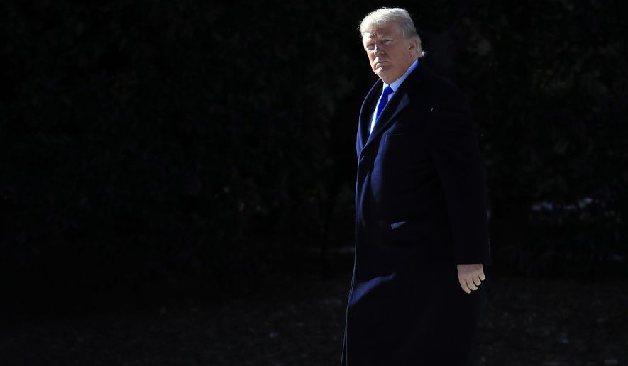 President Donald Trump walks from the Oval Office as he leaves the White House in Washington, Friday, Jan. 5, 2018, enroute to Camp David, Md., to participates in congressional Republican leadership retreat. (AP Photo/Manuel Balce Ceneta)