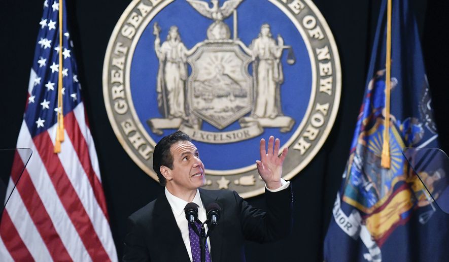 In this Wednesday, Jan. 3, 2018 file photo, New York Gov. Andrew Cuomo makes reference to his father Mario Cuomo as he delivers his state of the state address at the Empire State Plaza Convention Center in Albany, N.Y. (AP Photo/Hans Pennink)