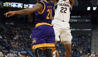 Connecticut&#39;s Terry Larrier shoots over East Carolina&#39;s B.J. Tyson during the second half of an NCAA college basketball game, Saturday, Jan. 6, 2018, in Hartford, Conn. (AP Photo/Jessica Hill)
