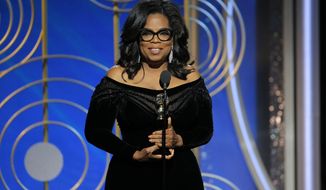 This image released by NBC shows Oprah Winfrey accepting the Cecil B. DeMille Award at the 75th Annual Golden Globe Awards in Beverly Hills, Calif., on Sunday, Jan. 7, 2018. (Paul Drinkwater/NBC via AP)