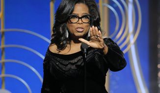 Oprah Winfrey accepts the Cecil B. DeMille Award at the 75th Annual Golden Globe Awards in Beverly Hills, Calif., on Sunday, Jan. 7, 2018. (Paul Drinkwater/NBC via AP)