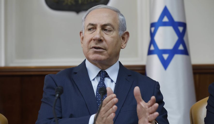 Israeli Prime Minister Benjamin Netanyahu chairs the weekly Cabinet meeting at his office in Jerusalem, Sunday, Jan. 7, 2018. (Abir Sultan/Pool via AP)