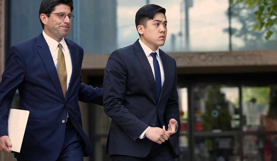 FILE – In this May 15, 2017, file photo, Sheldon Wong, right, leaves the Monroe County Courthouse in Stroudsburg, Pa. Wong is one of four men from the New York City borough of Queens who pleaded guilty to involuntary manslaughter in the 2013 death of Chun "Michael" Deng, a fraternity pledge from the Baruch College campus of the City University of New York, at a rented house in the Pocono Mountains. The four are set to be sentenced Monday, Jan. 8, 2018, along with the Pi Delta Psi fraternity itself, which was convicted after a trial. (AP Photo/Rich Schultz, File)