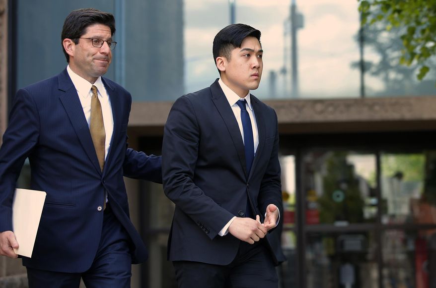 FILE – In this May 15, 2017, file photo, Sheldon Wong, right, leaves the Monroe County Courthouse in Stroudsburg, Pa. Wong is one of four men from the New York City borough of Queens who pleaded guilty to involuntary manslaughter in the 2013 death of Chun "Michael" Deng, a fraternity pledge from the Baruch College campus of the City University of New York, at a rented house in the Pocono Mountains. The four are set to be sentenced Monday, Jan. 8, 2018, along with the Pi Delta Psi fraternity itself, which was convicted after a trial. (AP Photo/Rich Schultz, File)