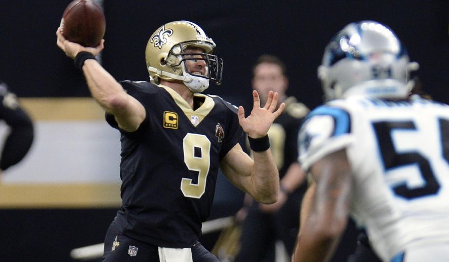 New Orleans Saints quarterback Drew Brees (9) passes in the first half of an NFL football game against the Carolina Panthers in New Orleans, Sunday, Jan. 7, 2018. (AP Photo/Bill Feig)