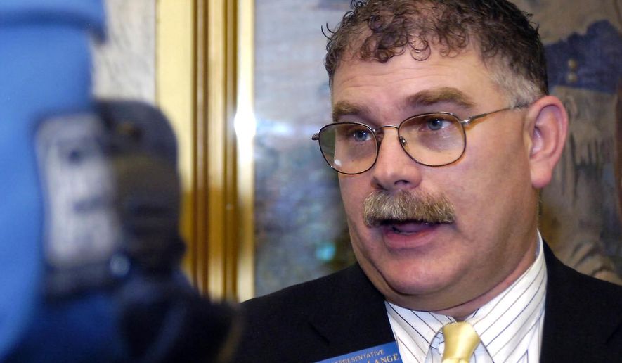 FILE - In this April 26, 2007, file photo, Montana House Majority Leader Rep. Michael Lange, R-Billings, speaks during a news conference in Helena, Mont. Prosecutors are seeking 28 years in prison for the former Republican lawmaker after he pleaded guilty to charges of distributing large volumes of methamphetamine in the Billings area. (George Lane /Independent Record via AP, File)
