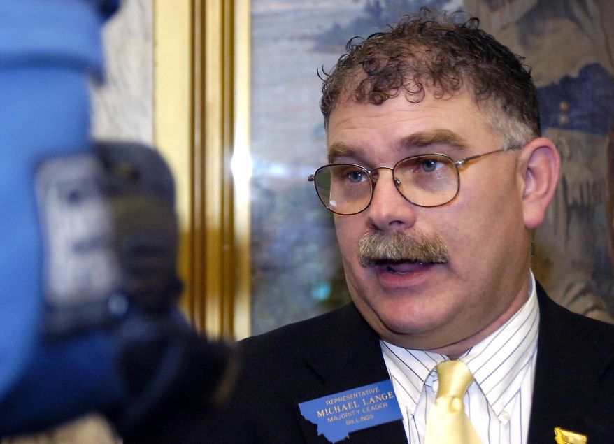 FILE - In this April 26, 2007, file photo, Montana House Majority Leader Rep. Michael Lange, R-Billings, speaks during a news conference in Helena, Mont. Prosecutors are seeking 28 years in prison for the former Republican lawmaker after he pleaded guilty to charges of distributing large volumes of methamphetamine in the Billings area. (George Lane /Independent Record via AP, File)