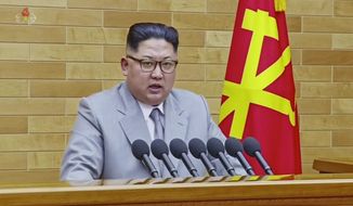 In this image made from video released by KRT on Jan. 1, 2018,  North Korean leader Kim Jong-un speaks in his annual address in undisclosed location, North Korea. (KRT via AP Video)  ** FILE **