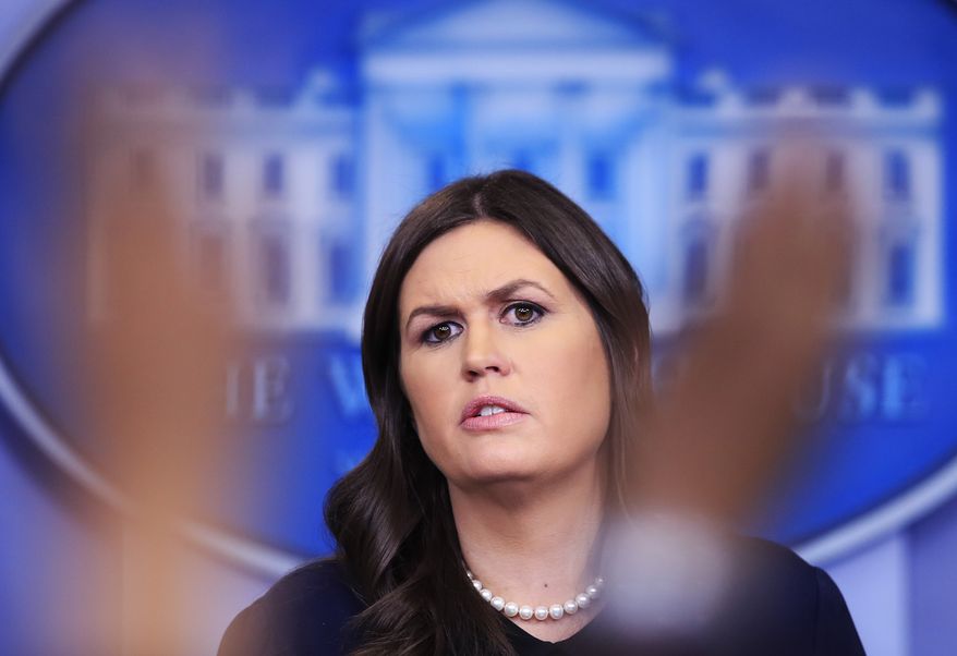 White House press secretary Sarah Huckabee Sanders talks to reporters during the daily press briefing in the Brady press briefing room at the White House, in Washington, Tuesday, Jan. 9, 2018. (AP Photo/Manuel Balce Ceneta)
