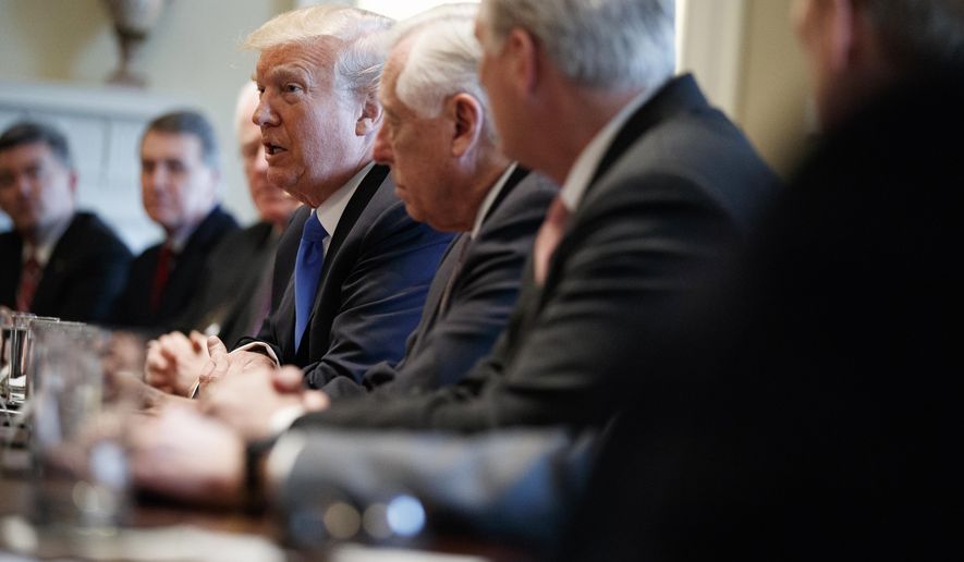 President Donald Trump speaks during a meeting with lawmakers on immigration policy in the Cabinet Room of the White House, Tuesday, Jan. 9, 2018, in Washington. (AP Photo/Evan Vucci)