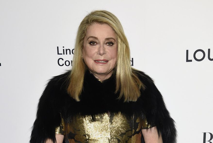 FILE- In this Nov. 30, 2017, file photo, Catherine Deneuve attends the Lincoln Center Corporate Fund Gala honoring Louis Vuitton artistic director of women's collections Nicolas Ghesquiere, at Alice Tully Hall in New York. Deneuve was among about 100 performers, scholars and others who signed an open letter published Tuesday, Jan. 9, 2018, by the newspaper Le Monde saying the "legitimate protest against sexual violence" stemming from the Harvey Weinstein scandal has gone too far and threatens hard-won sexual freedoms. (Photo by Evan Agostini/Invision/AP, File)