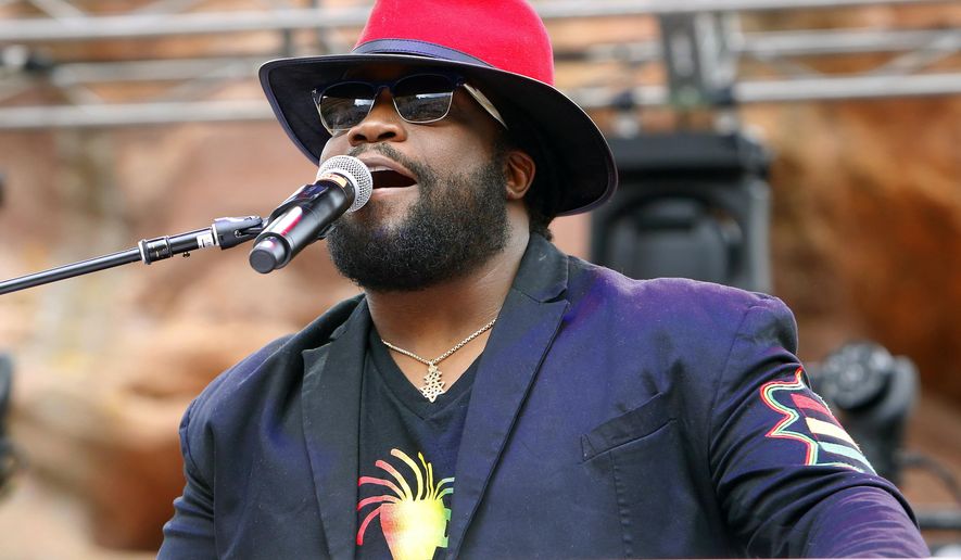FILE - In this Aug. 27, 2016 file photo, Morgan Heritage singer, Roy Morgan performs at Reggae on the Rocks in Denver, Colo. The band's latest album, “Avrakedabra,” is nominated for a Grammy for best reggae album. (Photo by Rick Scuteri/Invision/AP, File)