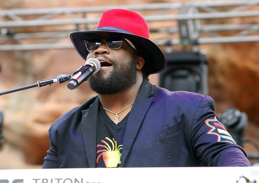 FILE - In this Aug. 27, 2016 file photo, Morgan Heritage singer, Roy Morgan performs at Reggae on the Rocks in Denver, Colo. The band's latest album, “Avrakedabra,” is nominated for a Grammy for best reggae album. (Photo by Rick Scuteri/Invision/AP, File)