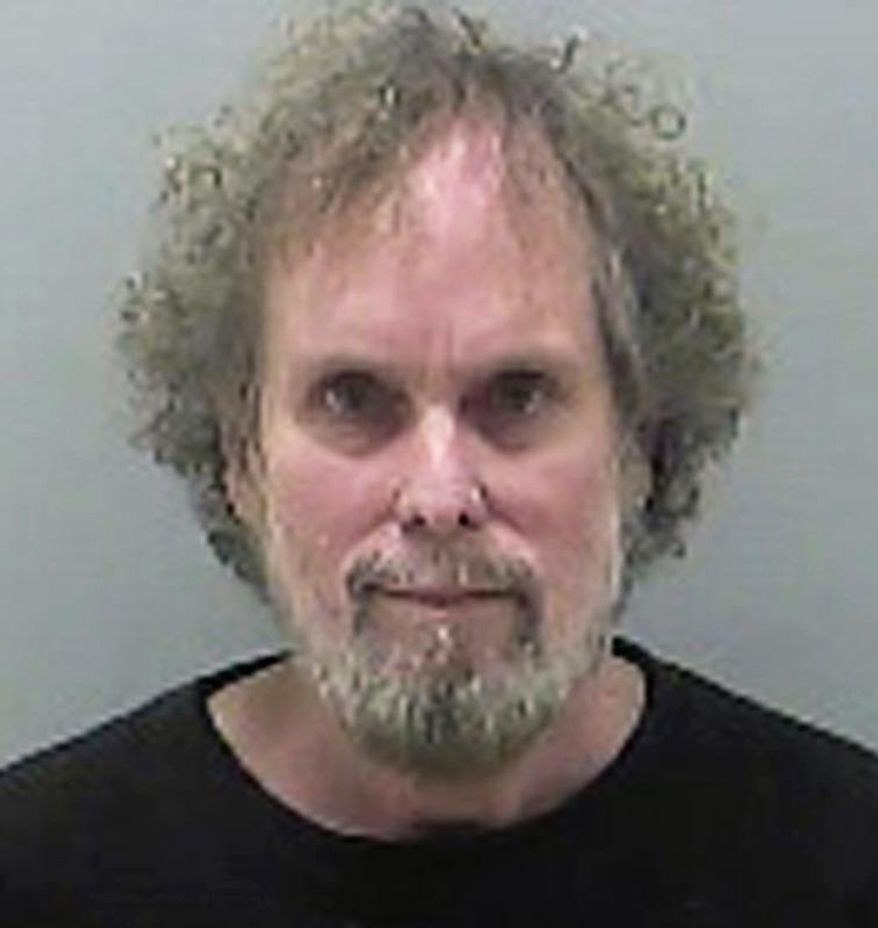 FILE – This undated file photo provided by the Delaware County Sheriff's Office in Delaware, Ohio, shows Tommy Thompson, jailed on contempt-of-court charges since December 2015 for violating terms of a plea deal by refusing to respond to questions about the location of 500 missing gold coins. A federal judge in Ohio has denied a request by the former treasure hunter to change prisons because of an allergy to fiberglass. Judge Algenon Marbley in Columbus said Monday, Jan. 8, 2018, that Thompson has never been diagnosed or treated for fiberglass sensitivity. (Delaware County Sheriff's Office via AP, File)