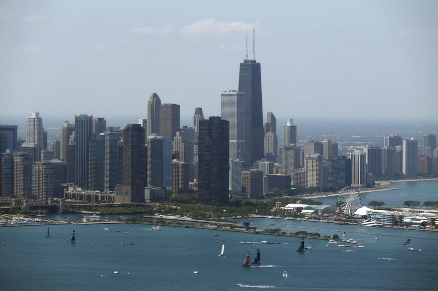 The Chicago skyline is shown in this July 2016 file photo. On March 15, 2018, the Windy City officially dropped its planned bid for hosting the 2026 FIFA World Cup. (AP Photo/Kiichiro Sato, File) **FILE**