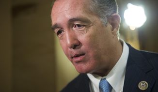 FILE - In this March 24, 2017 file photo, Rep. Trent Franks, R-Ariz. speaks with a reporter on Capitol Hill in Washington, as the House nears a vote on their health care overhaul. Thirteen Republicans and three Democrats filed enough signatures to make the ballot for a special primary election to replace former U.S. Rep. Franks, state elections officials said Wednesday evening, Jan. 10, 2018. (AP Photo/Cliff Owen, File)