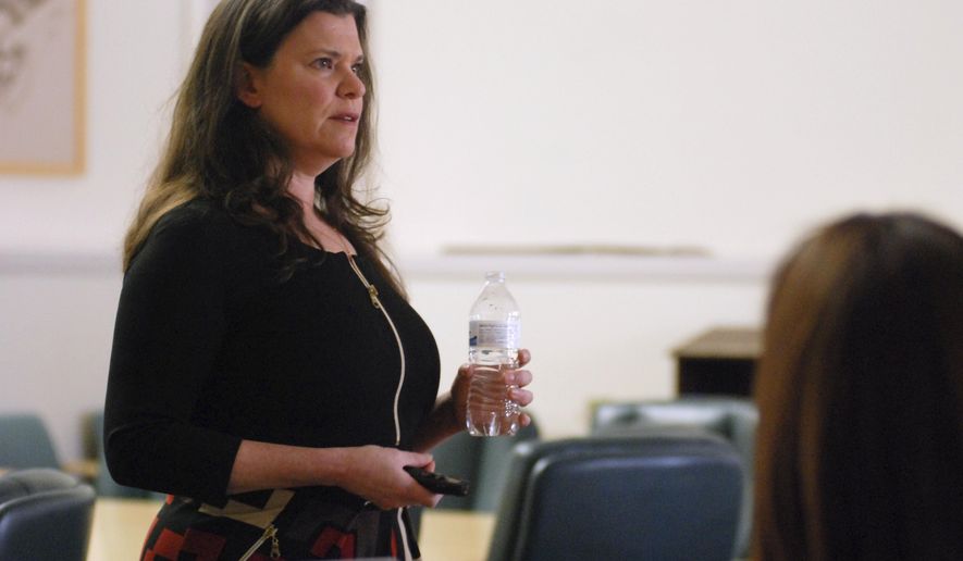 Human Resources consultant Linda Strauss provides training to some 40 registered New Mexico political lobbyists on how to recognize, prevent and report sexual misconduct and harassment, on Thursday, Jan. 11, 2018, in Santa Fe, N.M. The New Mexico Secretary of State's Office is encouraging training for lobbyists, and it will be required for lawmakers next week as the Legislature overhauls its anti-harassment policies. Female lobbyists and elected officials in New Mexico say widespread sexual harassment at the Statehouse has gone unchecked under current procedures for reporting and investigating abuse. (AP Photo/Morgan Lee)