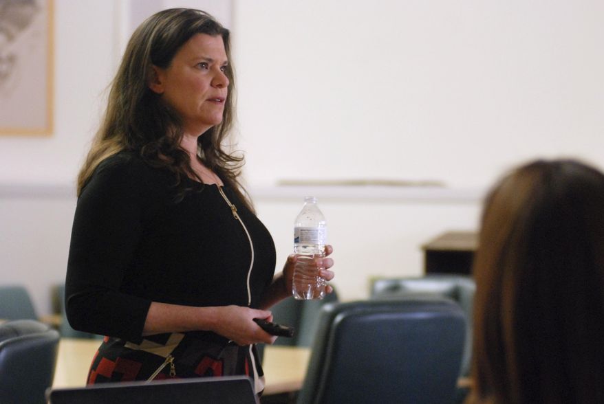 Human Resources consultant Linda Strauss provides training to some 40 registered New Mexico political lobbyists on how to recognize, prevent and report sexual misconduct and harassment, on Thursday, Jan. 11, 2018, in Santa Fe, N.M. The New Mexico Secretary of State's Office is encouraging training for lobbyists, and it will be required for lawmakers next week as the Legislature overhauls its anti-harassment policies. Female lobbyists and elected officials in New Mexico say widespread sexual harassment at the Statehouse has gone unchecked under current procedures for reporting and investigating abuse. (AP Photo/Morgan Lee)