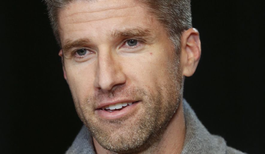Kyle Martino, a former United States national team midfielder and NBC Sports&#39; Premier League broadcaster, discusses his campaign to replace longtime incumbent Sunil Gulati as president of the United States Soccer Federation, during an interview Thursday Jan. 11, 2018, in New York. (AP Photo/Bebeto Matthews)