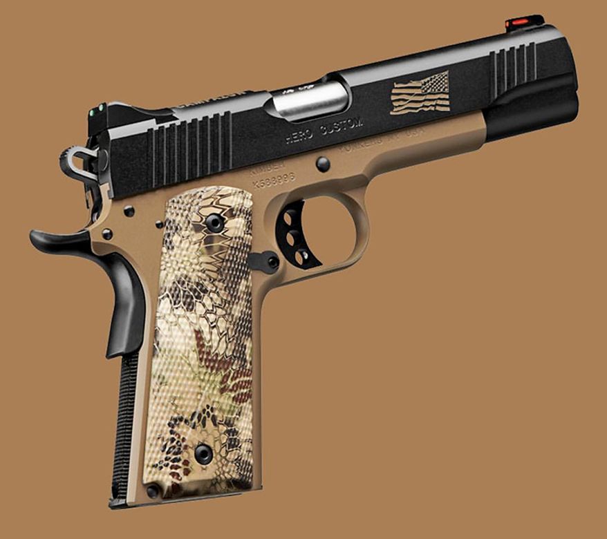 Kimber Hero is one of the best 1911 pistols around. It boasts fiber optic sights, Kryptek Highlander grips, desert tan frame and black slide with engraving