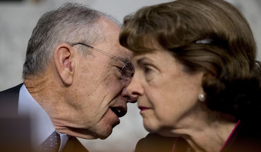 In this Oct. 3, 2017, file photo, Chairman Sen. Chuck Grassley, R-Iowa, and Ranking Member Sen. Dianne Feinstein, D-Calif., right, speak during a hearing on Capitol Hill in Washington. (AP Photo/Andrew Harnik) **FILE**