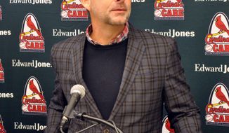 St. Louis Cardinals President John Mozeliak answers a question during a baseball news conference before the team&#39;s annual Winter Warm-Up on Saturday, Jan. 13, 2018 in St. Louis. Mozeliak said the Cardinals have improved after missing the playoffs for a second straight season last year thanks to deals such as a trade for outfielder Marcell Ozuna, and he continues to explore other possible trades or free agent signings. (AP Photo/Kurt Voigt)