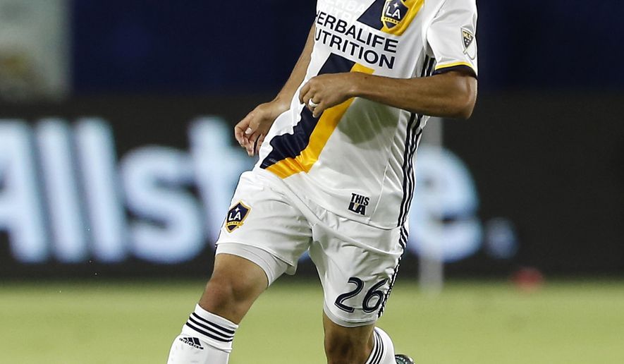 FILE - In this Oct. 26, 2016, file photo, Los Angeles Galaxy forward Landon Donovan controls the ball during the second half of a knockout-round MLS playoff soccer match against Real Salt Lake in Carson, Calif. Donovan is coming out of retirement for the second time in three years, this time to join Club Leon in Mexico. The Liga MX team announced Donovan’s return to soccer on Twitter on Friday night, Jan. 12, 2018. Donovan also tweeted about joining Club Leon, saying he was excited to face former U.S. teammate and current C.F. Pachuca player Omar Gonzalez next month. (AP Photo/Alex Gallardo, File)