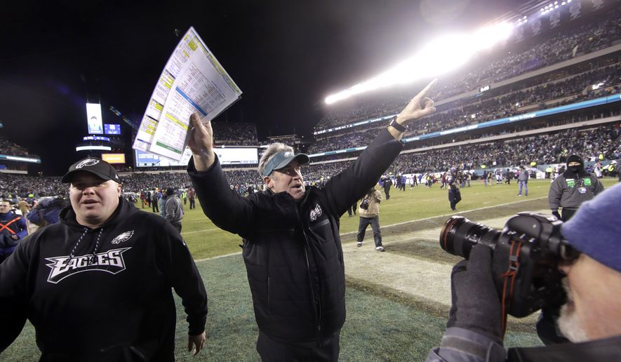 Philadelphia Eagles head coach Doug Pederson celebrates after an NFL divisional playoff football game against the Atlanta Falcons, Saturday, Jan. 13, 2018, in Philadelphia. Philadelphia won 15-10. (AP Photo/Matt Rourke)