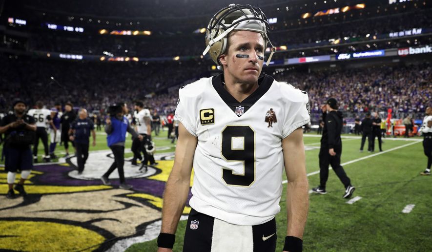 New Orleans Saints quarterback Drew Brees (9) walks off the field after a 29-24 loss to the Minnesota Vikings in an NFL divisional football playoff game in Minneapolis, Sunday, Jan. 14, 2018. The Vikings defeated the Saints 29-24. (AP Photo/Jeff Roberson) ** FILE **