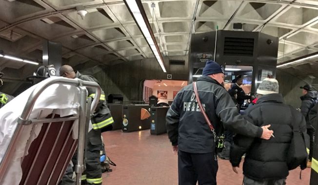 Emergency crews evacuate a Metro train that had derailed Monday, Jan. 15, 2018, in Washington, D.C. There were no injuries or fire. (Image courtesy D.C. Fire and EMS Twitter)