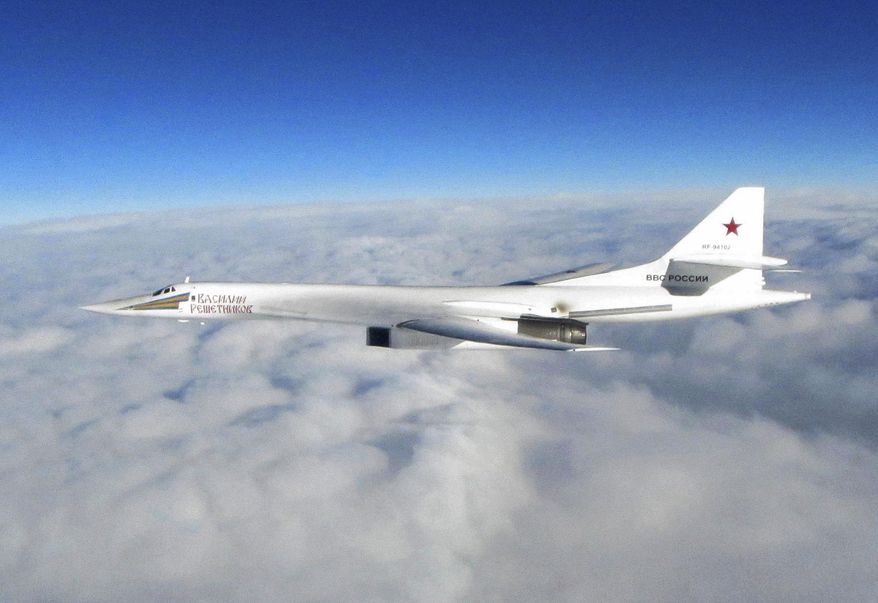 In this image made available by the Royal Air Force Monday, Jan. 15, 2018, one of Russian Blackjack Tupolev Tu-160 long-range bombers is photographed by an RAF aircraft, scrambled from RAF Lossiemouth, Scotland. The incident Monday is one of several in recent years as Russian military planes test NATO and British air defenses. (Royal Air Force via AP)