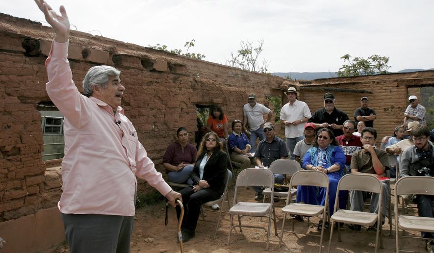 FILE - In this Tuesday, June 5, 2007, file photo, Reies Lopez Tijerina, 80, a land grant activist, speaks to friends and family at his Carlos Tijerina ranch in Coyote, N.M. The 1968 murder of a New Mexico Hispanic jailer, Eulogio Salazar who was preparing to testify against Hispanic land grant leader-activist Tijerina and his followers remains a mystery. The group was accused of leading an armed raid of the Tierra Amarilla Courthouse several months earlier. Tijerina long denied any role in Salazar&#x27;s murder. (Jane Phillips/Santa Fe New Mexican via AP)
