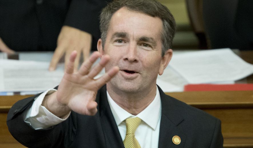 Virginia Gov. Ralph Northam waves to the gallery as he prepares to deliver his State of the Commonwealth address before a joint session of the Virginia General Assembly at the Capitol in Richmond, Va., Monday, Jan. 15, 2018. (AP Photo/Steve Helber) ** FILE **