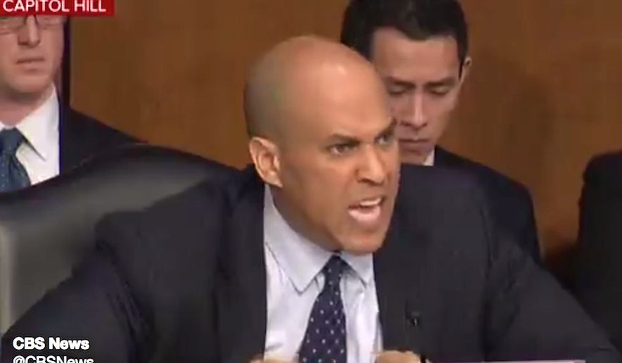 Sen. Cory Booker harangues Homeland Security Secretary Kristjen Nielsen about President Trump&#39;s rhetoric, Jan. 16, 2018. The New Jersey Democrat told members of the Senate Judiciary Committee that he recently had &quot;tears of rage&quot; in his eyes over remarks attributed to Mr. Trump. (Image: CBS News screenshot)