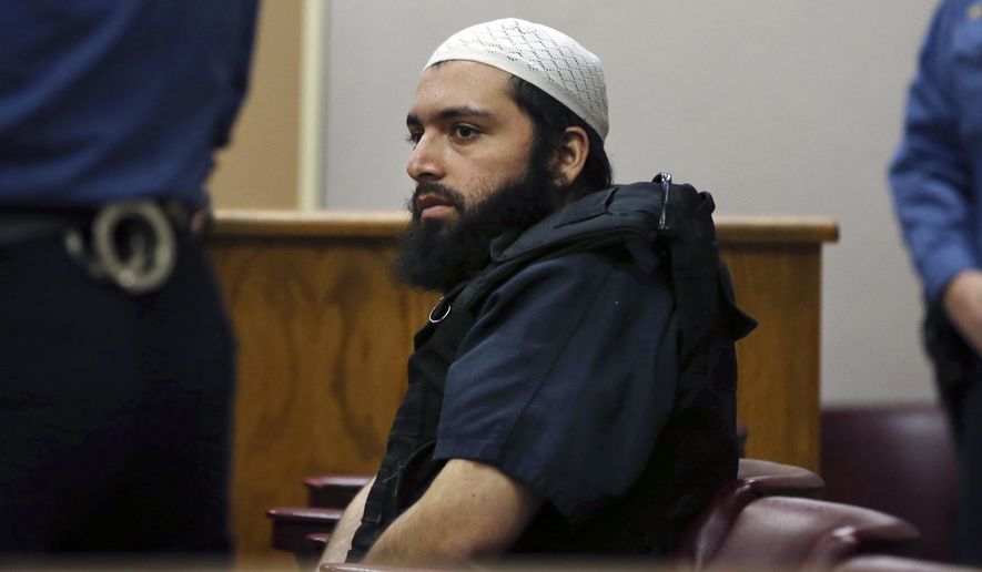 FILE - In this Dec. 20, 2016 file photo, Ahmad Khan Rahimi, the man accused of setting off bombs in New Jersey and New York&#x27;s Chelsea neighborhood in September, sits in court in Elizabeth, N.J. Prosecutors are urging a judge to impose a life sentence on Rahimi. The government made its arguments in papers filed Tuesday, Jan. 16, 2018, in Manhattan federal court. (AP Photo/Mel Evans, File)