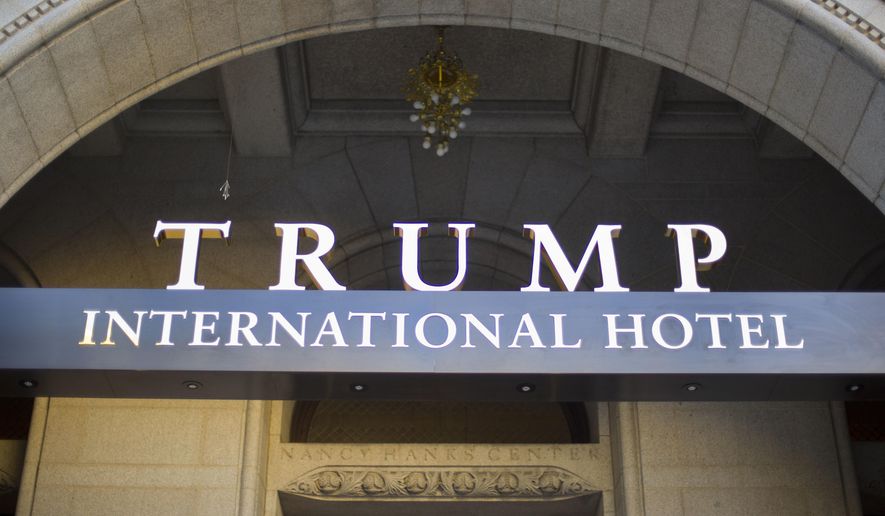 FILE - This Sept. 12, 2016, file photo, shows the exterior of the Trump International Hotel in downtown Washington. More than 60 groups, including foreign governments, political campaigns and business organizations, spent money at Trump-branded properties across the U.S. last year, according to a report Tuesday by a watchdog group that has long been critical of how such spending could be used to influence the president. (AP Photo/Pablo Martinez Monsivais, File)